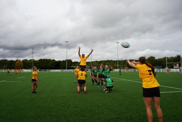 Girls playing rugby