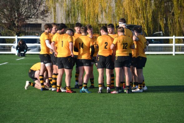 Boys playing rugby